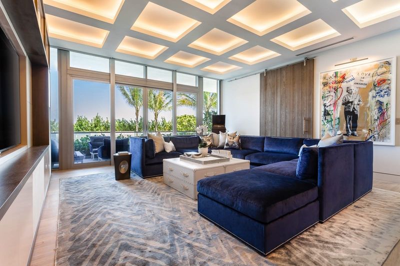Family room under a coffered, backlit ceiling at Beach House 200, 321 Ocean Drive, Miami Beach — photo 7 of 8