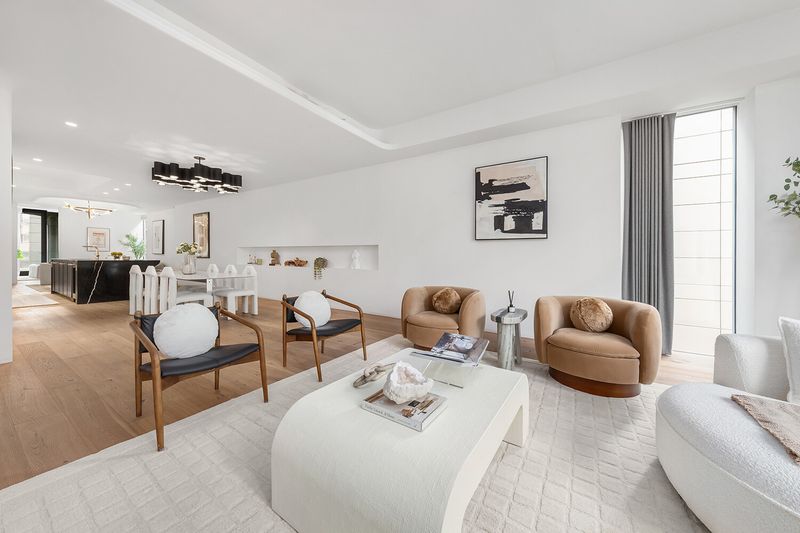 Open living and dining area at 325 West Broadway 7B, SoHo — photo 4 of 13