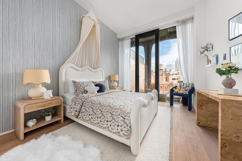 Bedroom with canopy bed at 325 West Broadway 7B, SoHo — photo 9 of 13