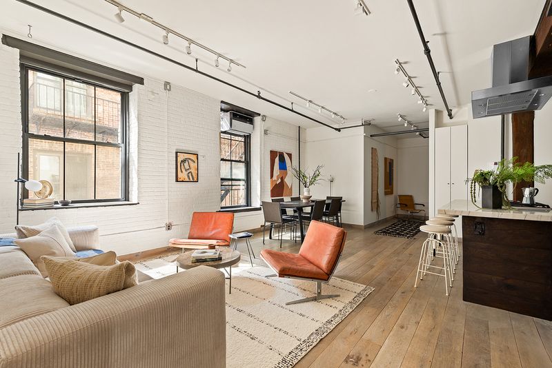 Living room toward the kitchen at 33 Bleecker Street 3B, NoHo — photo 4 of 9