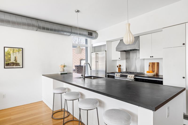 Chef's kitchen island at 361 Manhattan Avenue 3AB, Williamsburg — photo 4 of 9