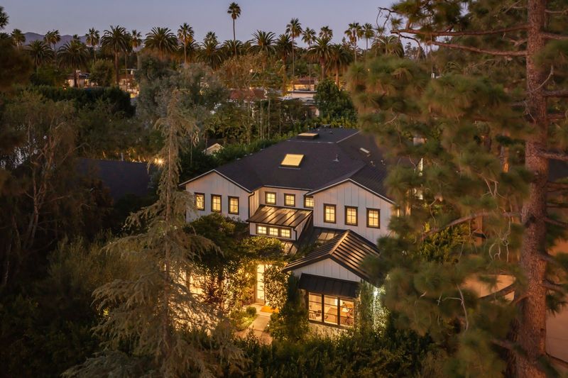Aerial at dusk among tall pines at 371 20th Street, Santa Monica — photo 3 of 8