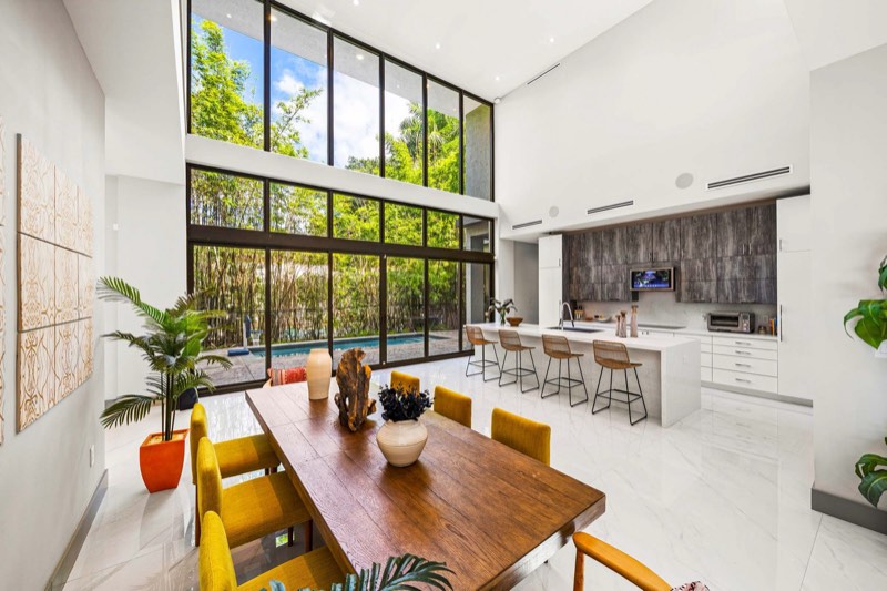 dining to double-height kitchen / pool glass at 4185 Ventura Avenue
