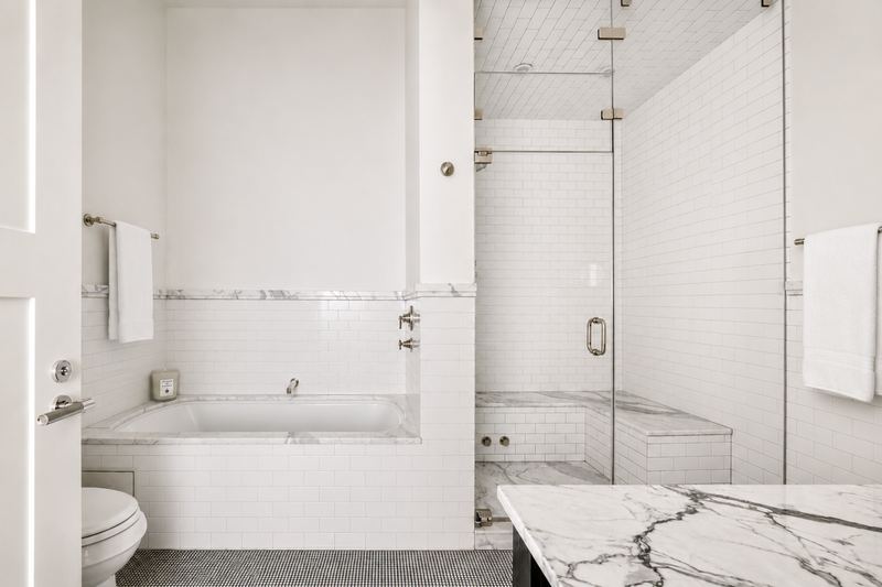The marble spa bath, with steam shower and soaking tub at 42 Wooster Street #3, SoHo — photo 11 of 13