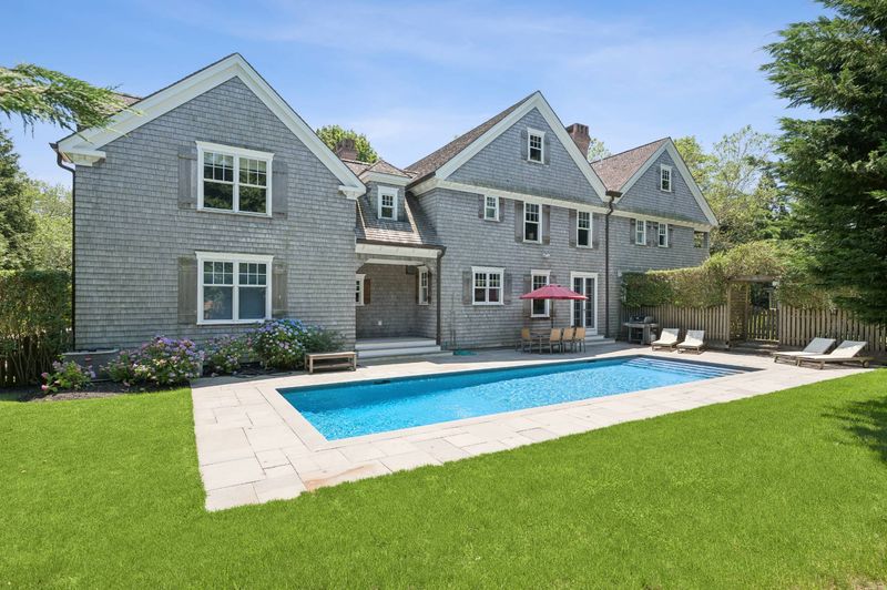 Heated Gunite pool and rear terrace at 5 New Lane, Southampton — photo 3 of 12