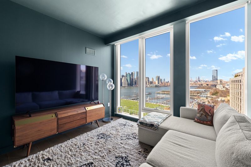 Den/bedroom with skyline view at 50 Bridge Park Drive 16B, Brooklyn Heights — photo 5 of 12