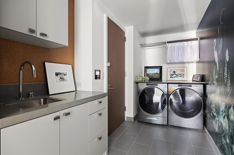 Built-out mudroom with laundry at 50 Bridge Park Drive 16B, Brooklyn Heights — photo 12 of 12