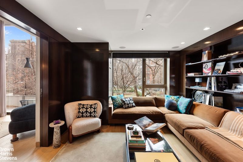 Library seating with park windows at 50 Gramercy Park North 3B, Gramercy Park — photo 4 of 10