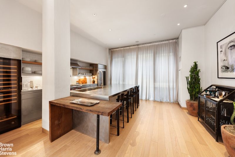 Chef's kitchen with island at 50 Gramercy Park North 3B, Gramercy Park — photo 5 of 10