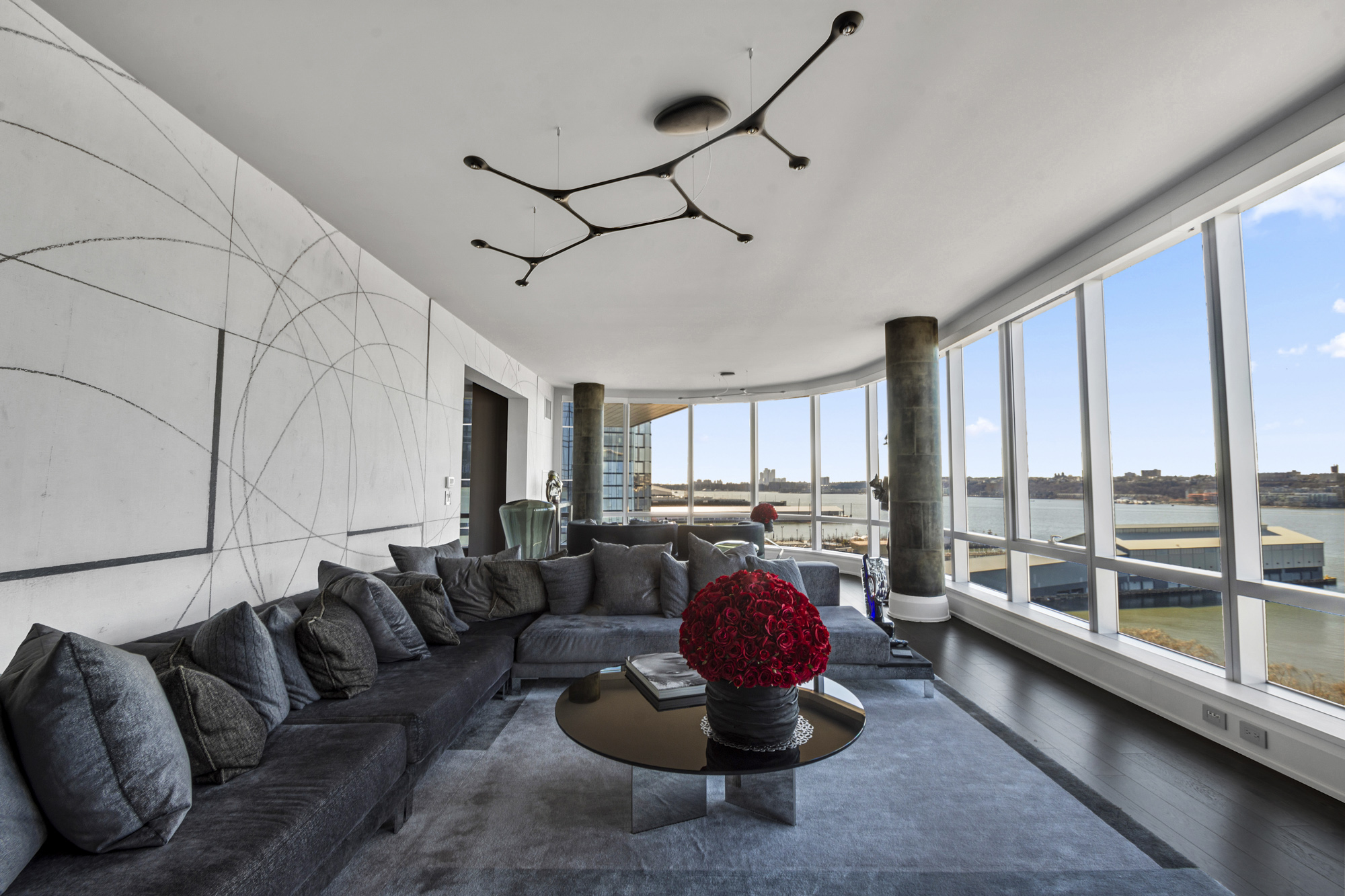 living room opening to the Hudson at 50 Riverside Boulevard 10L