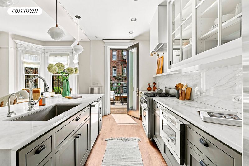 Robinson + Grisaru kitchen with marble island at 506 13th Street, Park Slope — photo 3 of 10