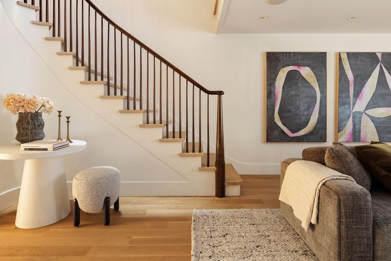 Parlor-floor stair hall with curved banister at 53 West 71st Street, Upper West Side — photo 2 of 7
