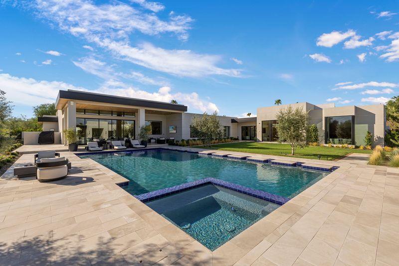 Pool toward main house at 5441 E Via Buena Vista, Paradise Valley — photo 5 of 10