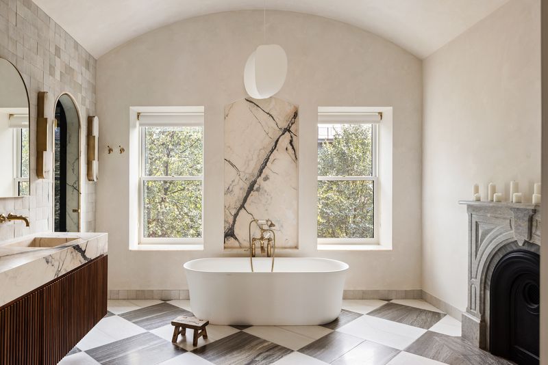 Hammam-like primary bath with a freestanding tub and fireplace at 59 Lefferts Place, Clinton Hill — photo 6 of 10