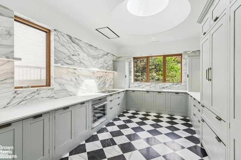 Marble chef's kitchen with garden windows at 611 2nd Street, Park Slope