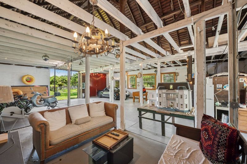 Barn studio with exposed timber trusses at 645 North Sea Mecox Road, Southampton — photo 12 of 12