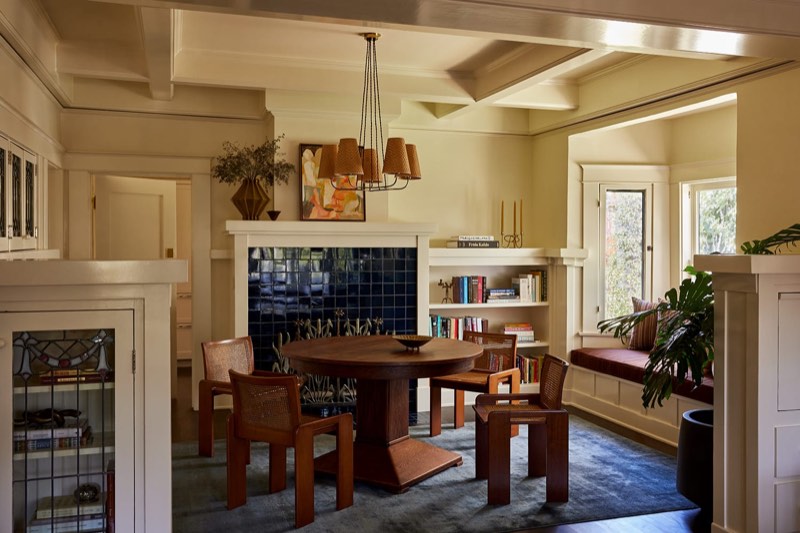 dining blue tile fireplace at 649 Palms Boulevard