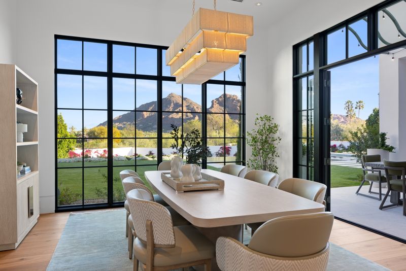 Dining steel windows at 6541 N 48th St, Paradise Valley — photo 4 of 10