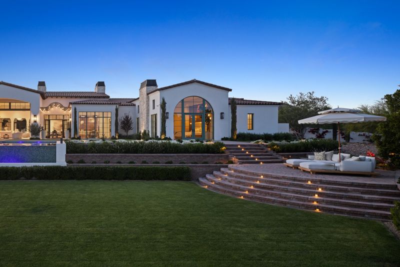 Arched entry twilight at 6541 N 48th St, Paradise Valley — photo 6 of 10