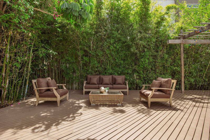 Lounge deck wrapped in tall bamboo at 718 Westbourne Drive, West Hollywood — photo 4 of 5
