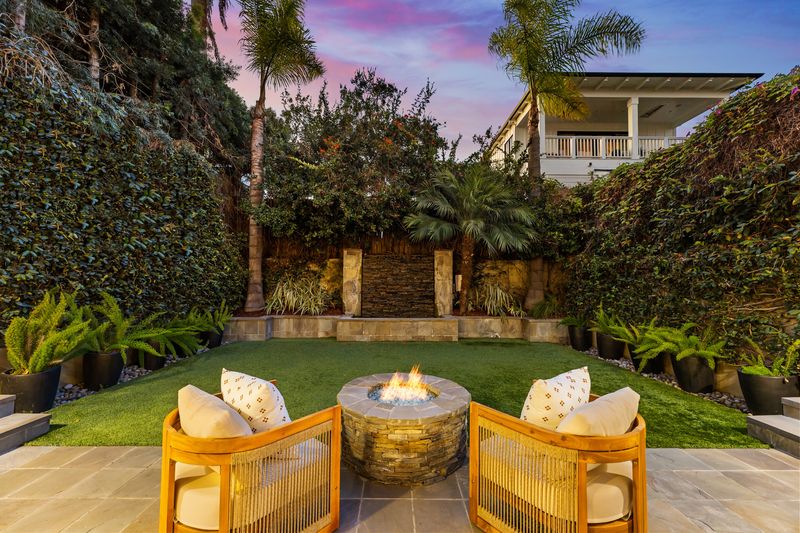 Backyard fire pit at dusk at 721 12th Street, Manhattan Beach — photo 2 of 8