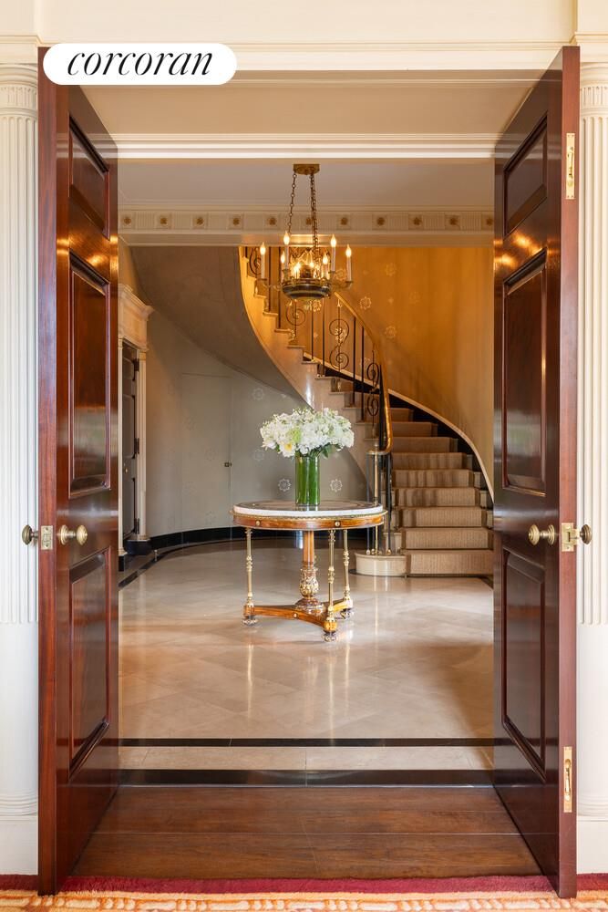 View from the gallery to Candela's curved staircase at 740 Park Avenue 6/7D, Lenox Hill — photo 4 of 12