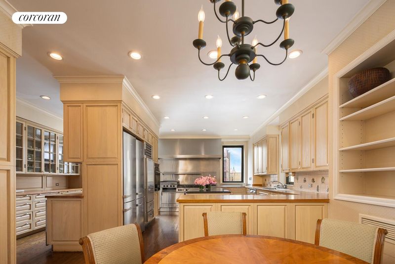 Windowed eat-in kitchen at 740 Park Avenue 6/7D, Lenox Hill — photo 6 of 12