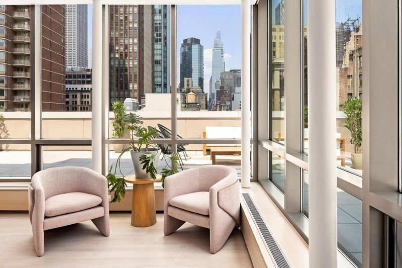 Window corner with Midtown skyline view at 76 Madison Avenue PH1, NoMad — photo 3 of 8