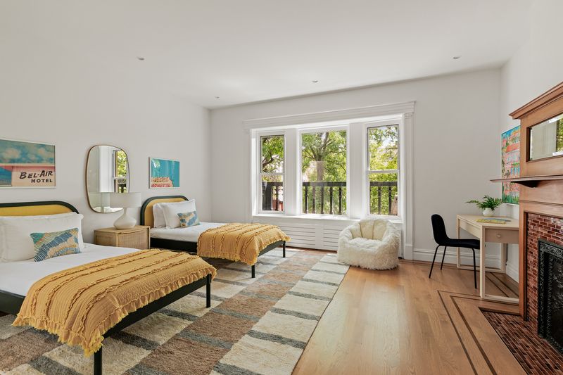Bedroom with fireplace at 8 Polhemus Place, Park Slope — photo 12 of 12