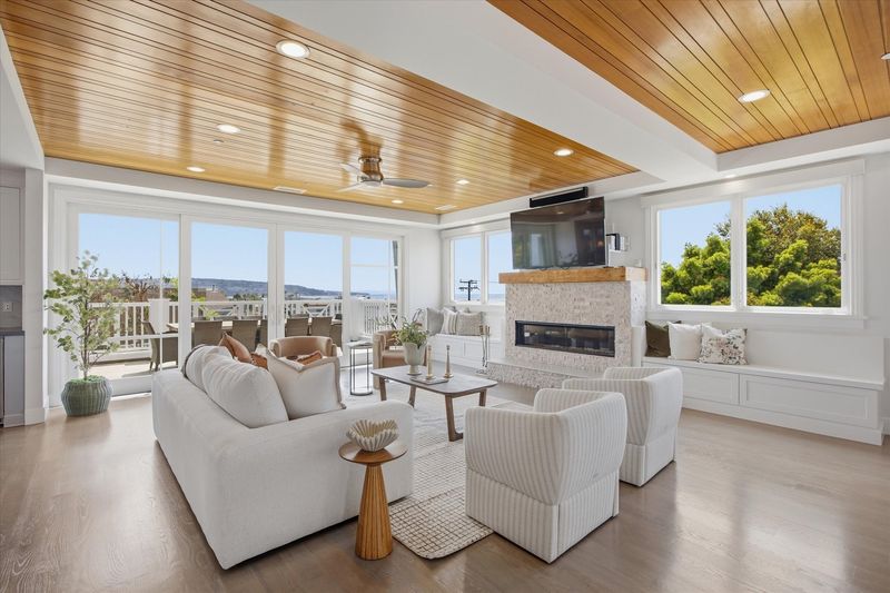 Living room with coffered wood ceiling and coastal outlook at 826 18th Street, Hermosa Beach