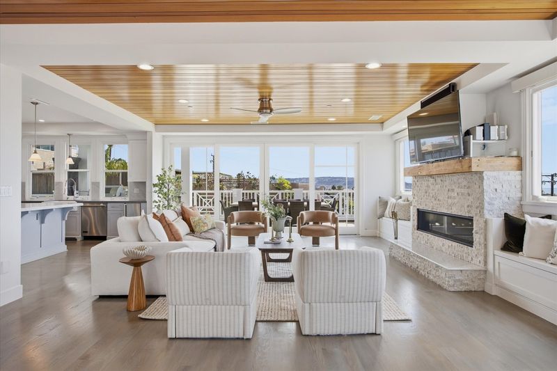 Great room with fireplace and wood ceiling at 826 18th Street, Hermosa Beach — photo 2 of 8