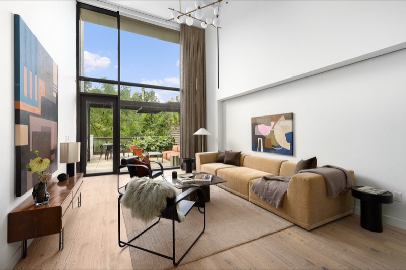 great room with 21-foot ceilings at Pierhouse N210