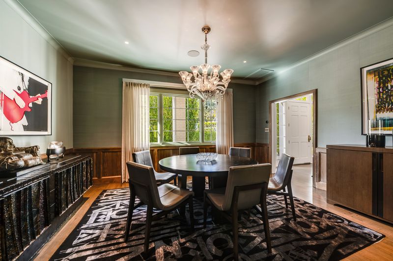 Dining room with garden windows at 9551 Lime Orchard Road, Beverly Hills — photo 6 of 8