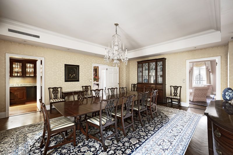 Formal dining room with chandelier at 993 Fifth Avenue, Residence 4, Upper East Side — photo 4 of 12