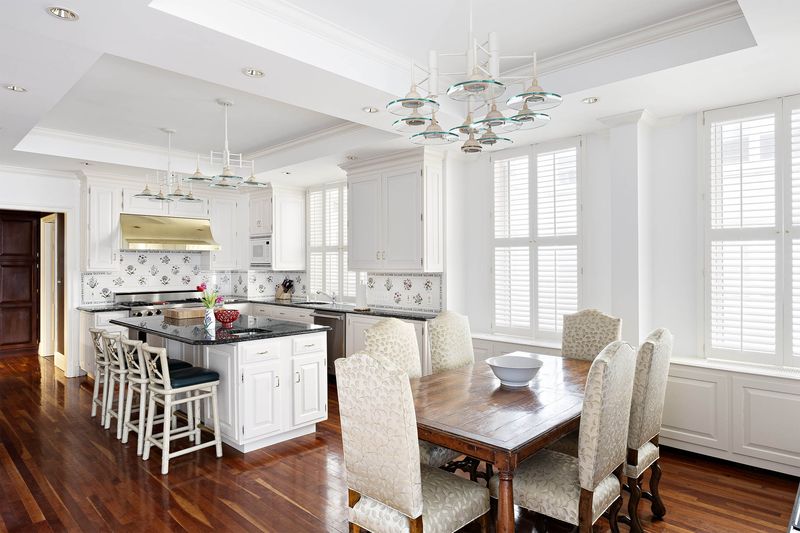 Eat-in kitchen with island at 993 Fifth Avenue, Residence 4, Upper East Side — photo 7 of 12