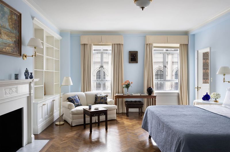 Bedroom with fireplace and built-ins at 993 Fifth Avenue, Residence 4, Upper East Side — photo 8 of 12